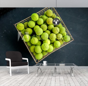 Bild på Top view of green tennis balls in a busket
